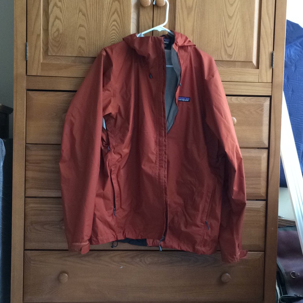 Patagonia Torrentshell.   Light rain/wind shell.